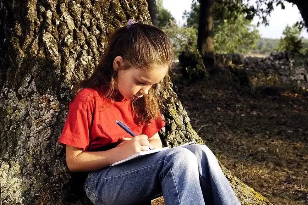 Child studying Tudor Rich and Poor Facts and Comparisons