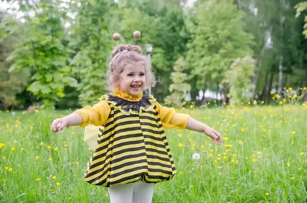 child with bee puns