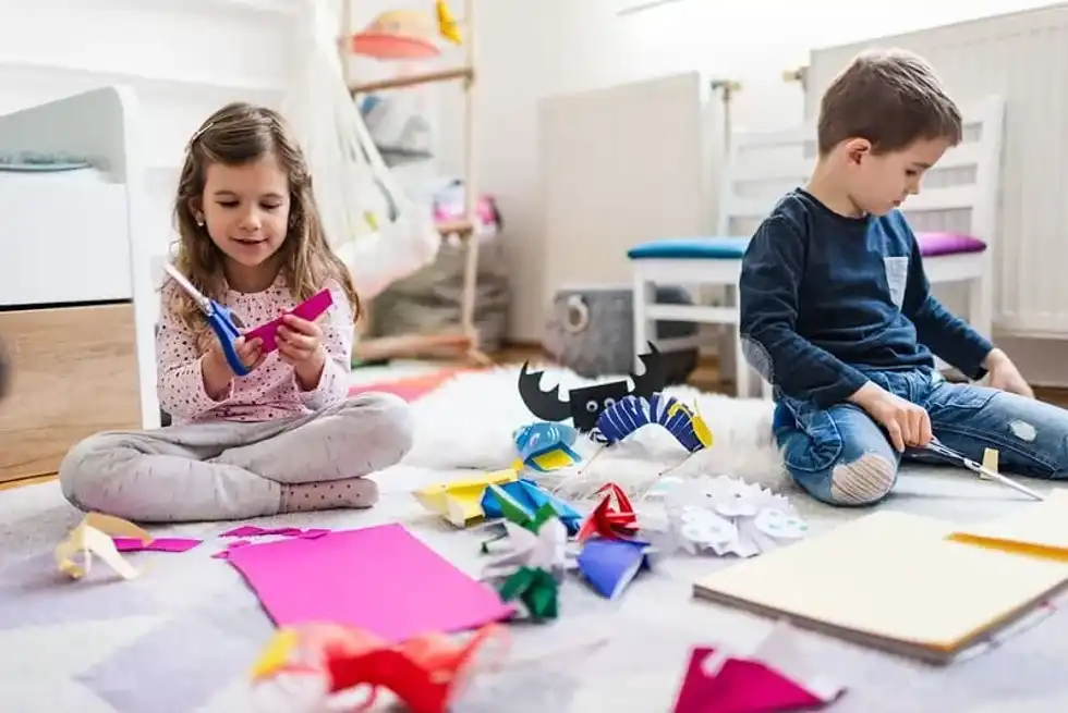 Children doing 3D paper art projects