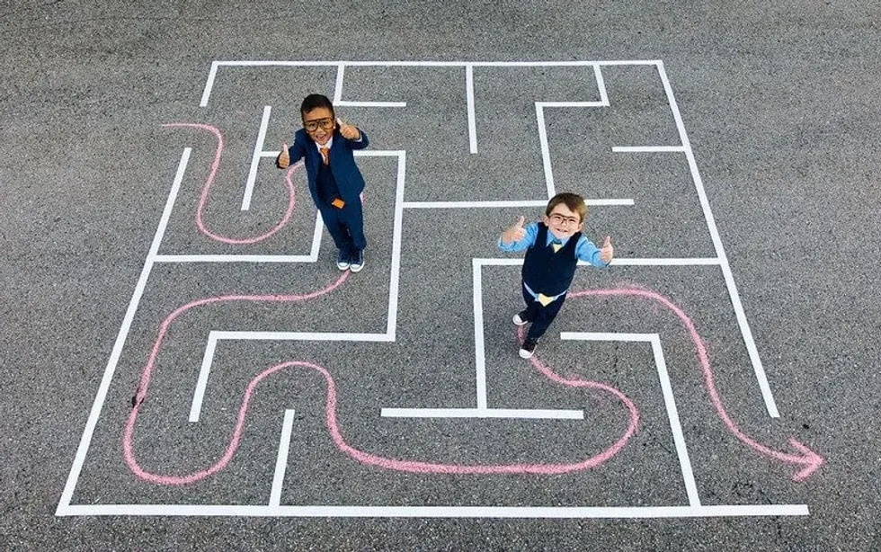 Children participating in maze activities