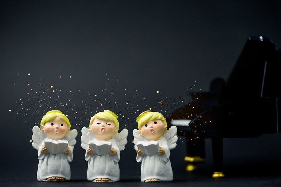 Christmas caroling or Angel Carolers singing