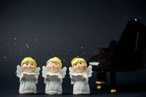 Christmas caroling or Angel Carolers singing