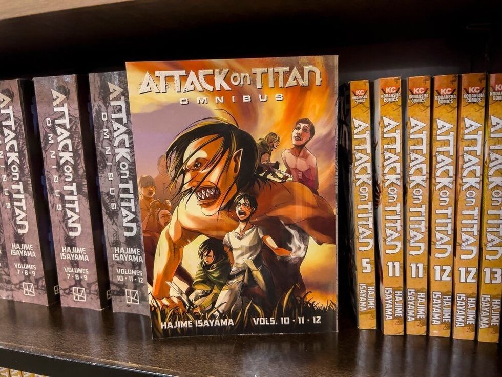 Close up, selective focus on Attack On Titan manga for sale inside a Barnes and Noble.