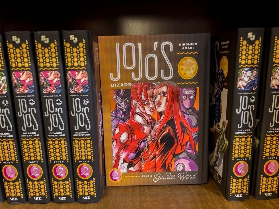Close up, selective focus on JoJo's Bizarre Adventure manga for sale inside a Barnes and Noble.