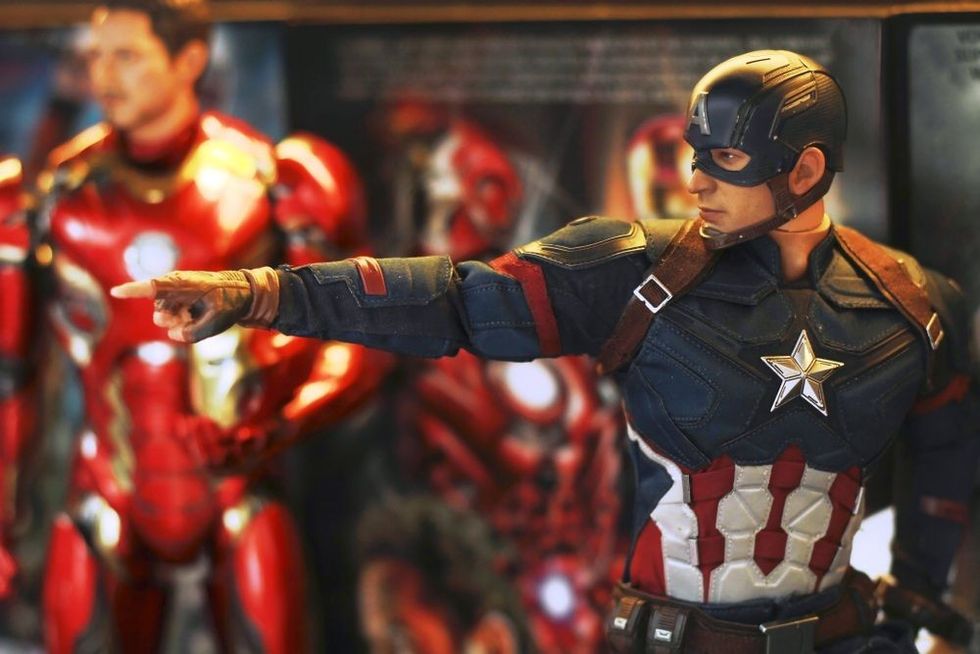 Close up shot of Captain America Civil War superheros figure in action fighting.