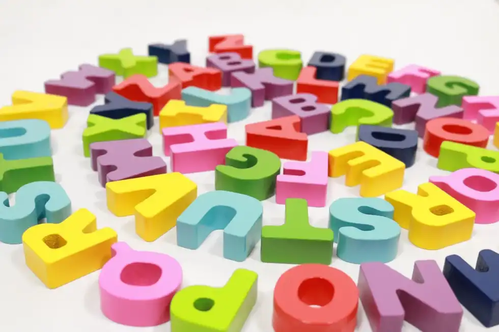Colorful alphabet blocks arranged in a circle