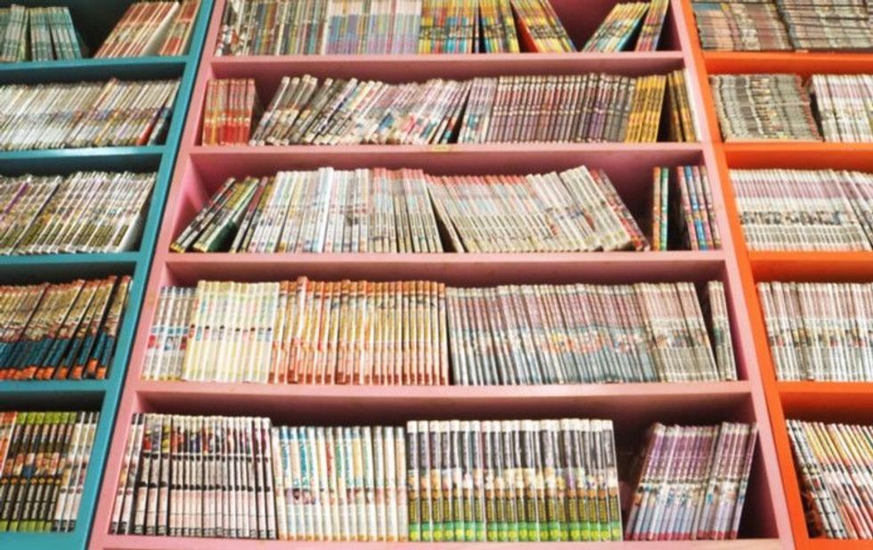 Comic books in bookshelves