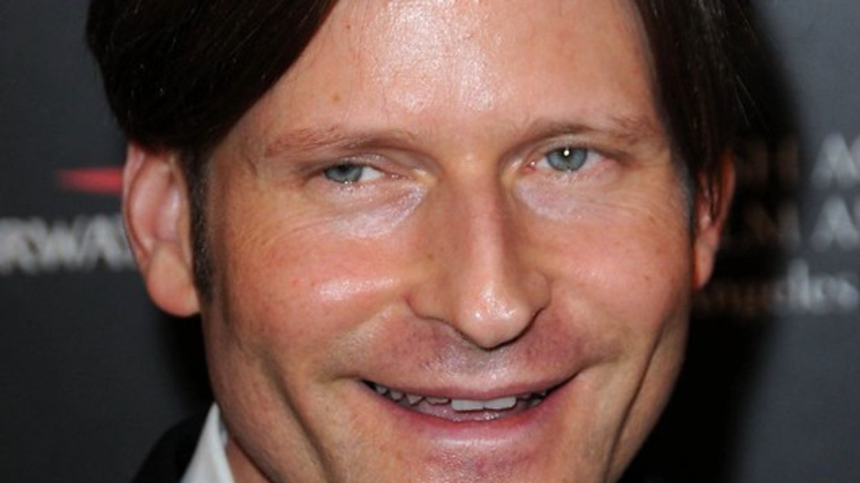 Crispin Glover at the 18th Annual BAFTA Los Angeles Britannia Awards, Century Plaza Hotel, Century City, CA, smiling in a black tuxedo with a white shirt and black bow tie.