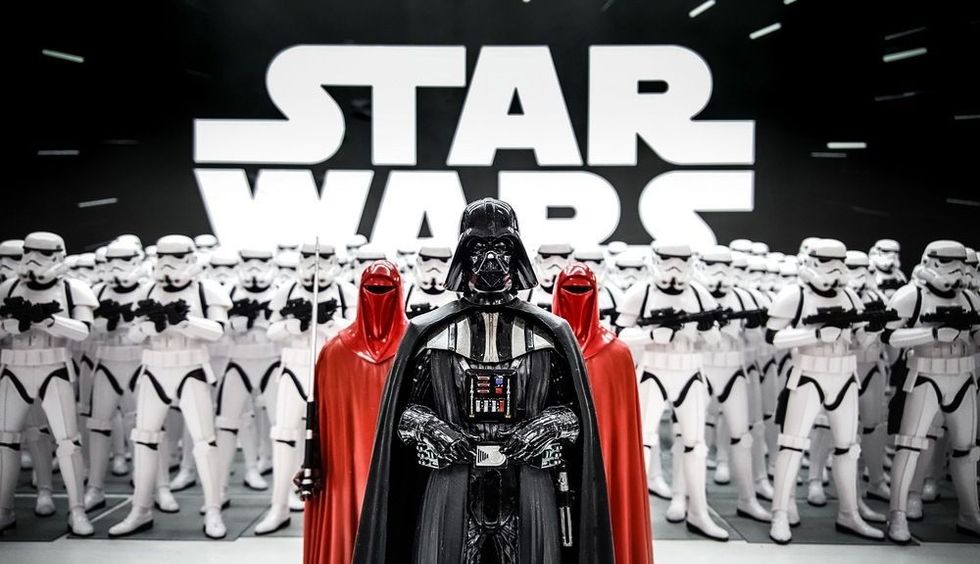 Darth Vader from Star wars with Stormtroopers army figures in background