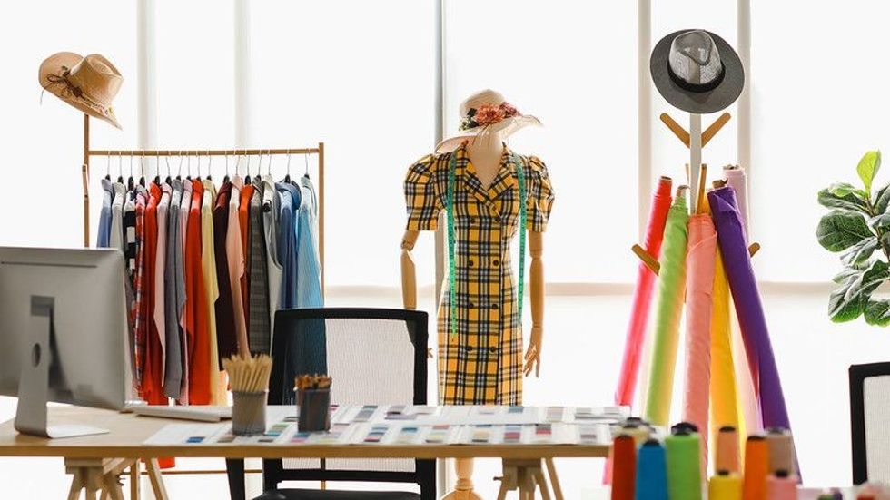 Designers office with clothes and necessary items