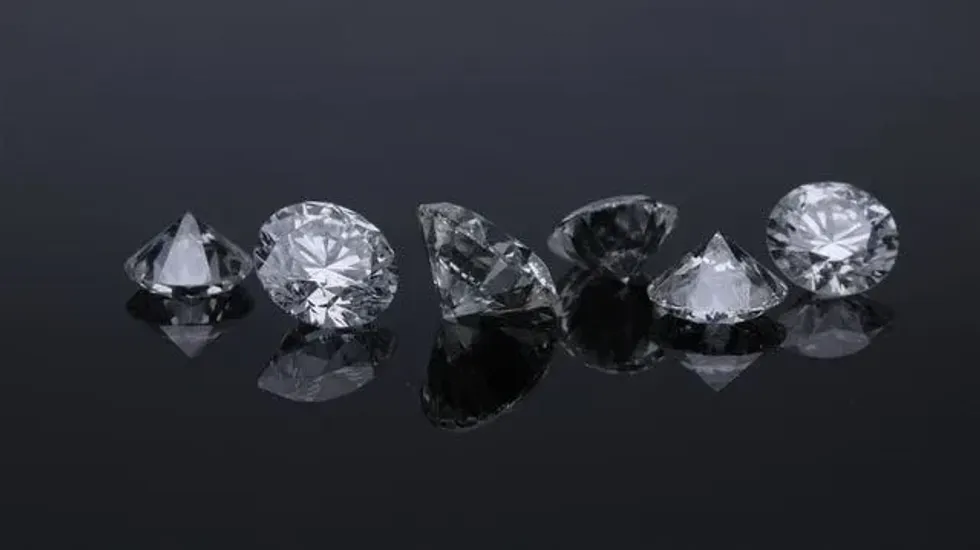 Diamonds are made from carbon under the surface of the Earth.