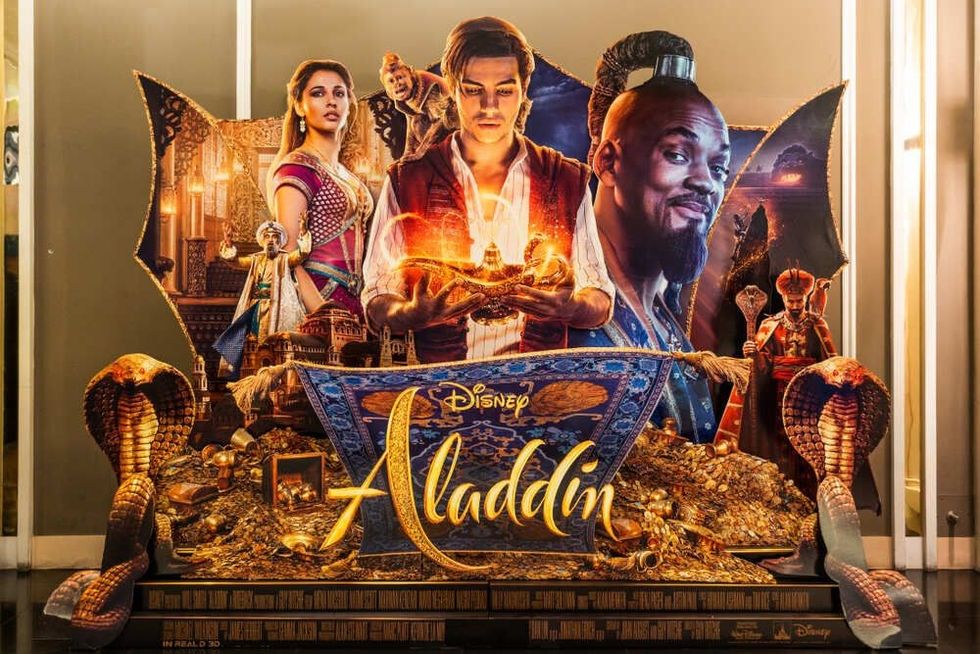 Disney's Aladdin movie backdrop display in movie theatre