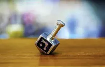 Dreidel on a table.