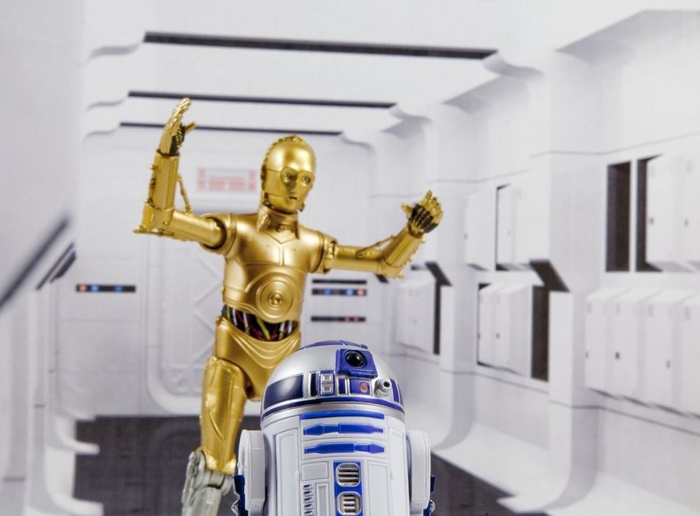 Droids R2-D2 and C-3PO escaping the Tantive IV while under Imperial attack.