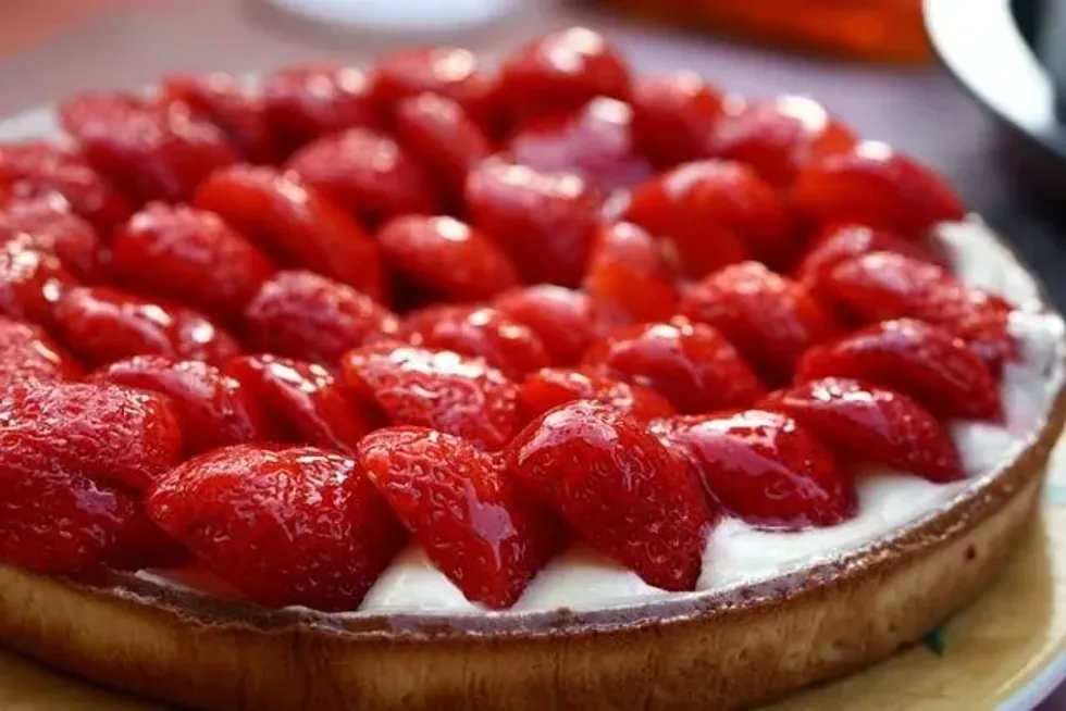 Eat a pie served with cream and fresh strawberries on National Strawberry Cream Pie Day.