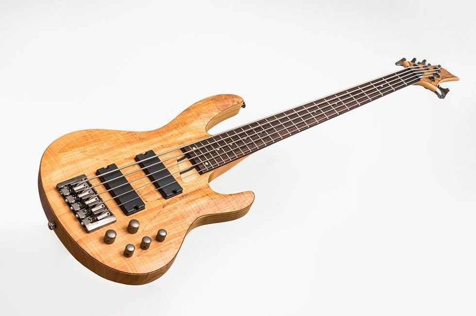 Electric bass guitar isolated on white background