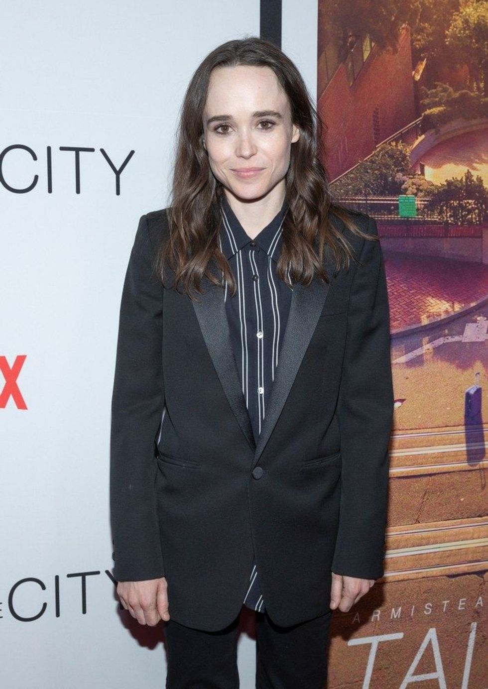 Ellen Page in a black suit