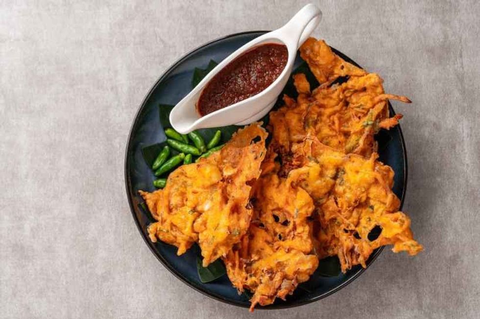 Enjoy National Fritters Day with some delicious apple fritters.
