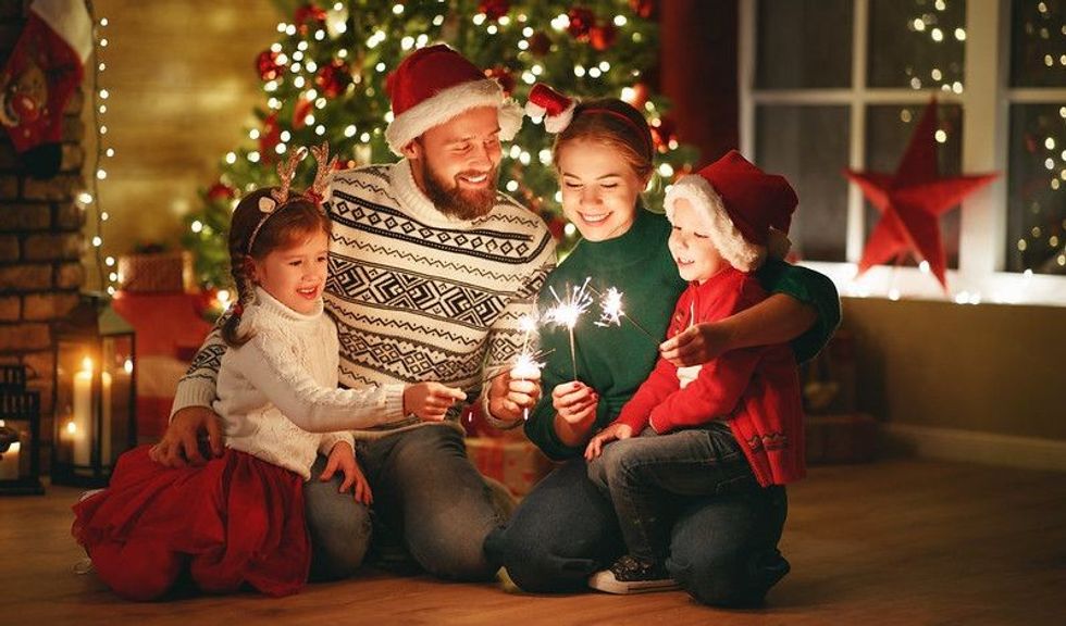 Family celebrating Christmas on Christmas Eve