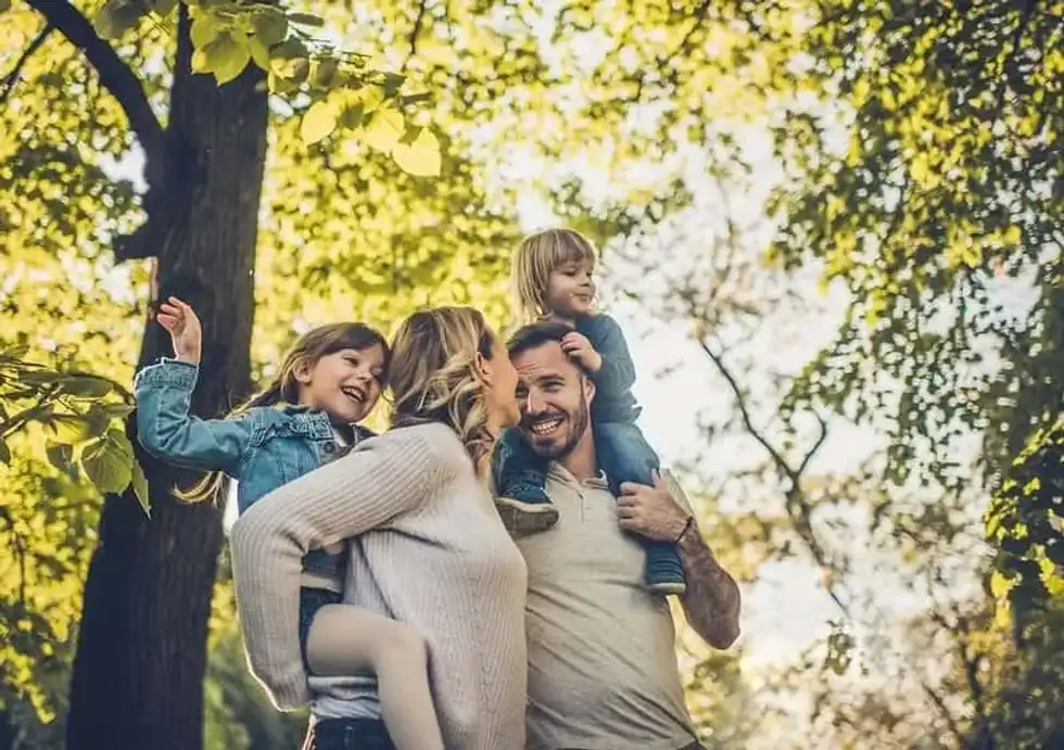 Family enjoying a day out in nature at Wepre Park.