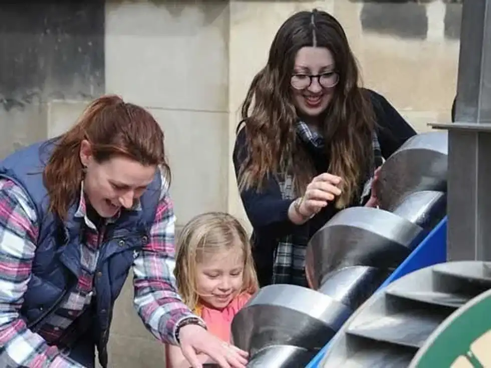 Family having fun at an exhibition
