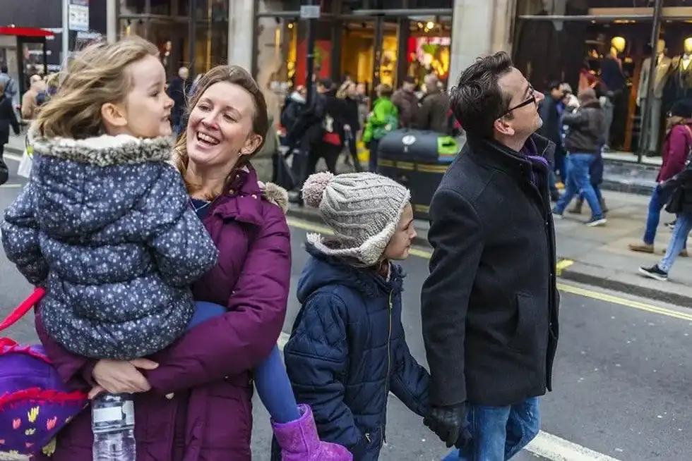 Family out in winter in London