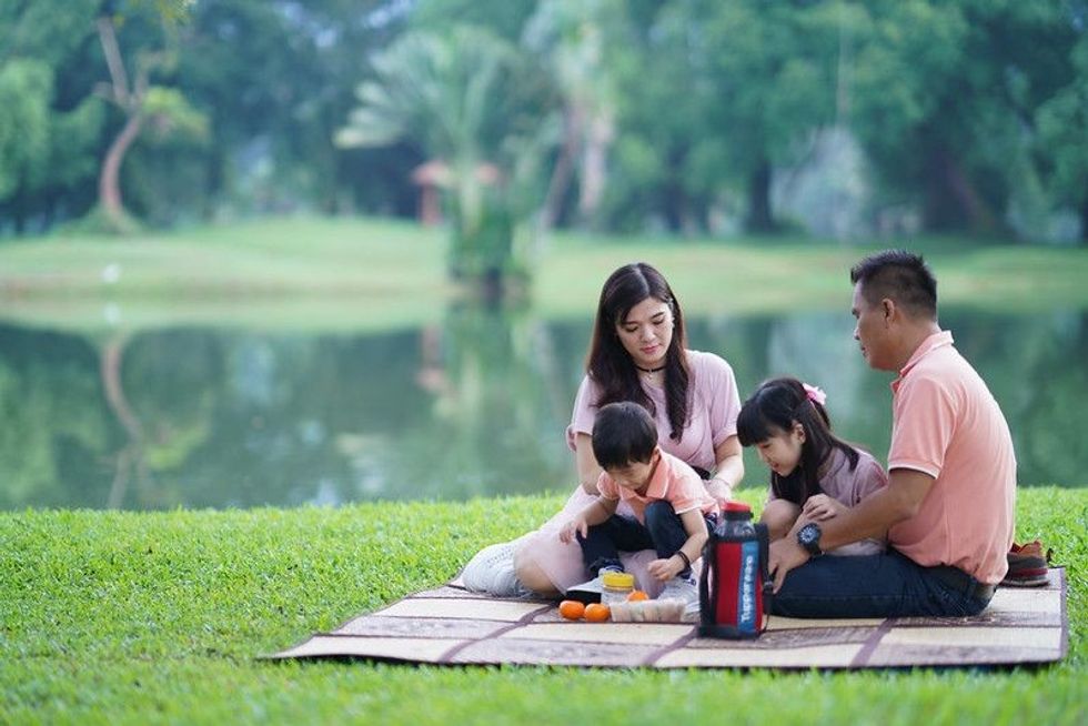 Family picnic near a lake