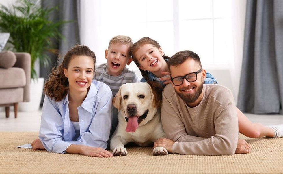 Family with a pet dog.