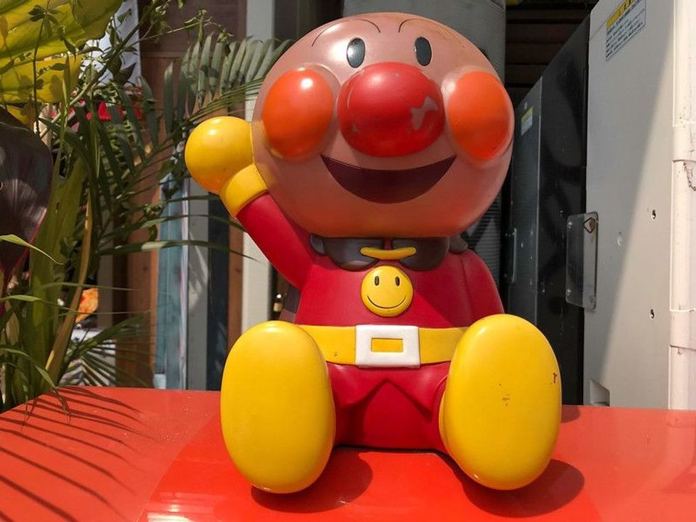 famous Japanese animation character in front of the shop