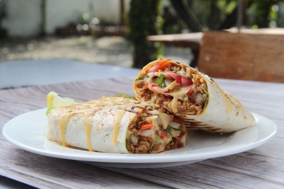Freshly made pork burritos on a plate