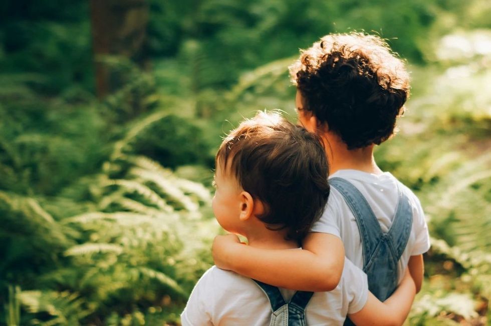 Friends hug each other
