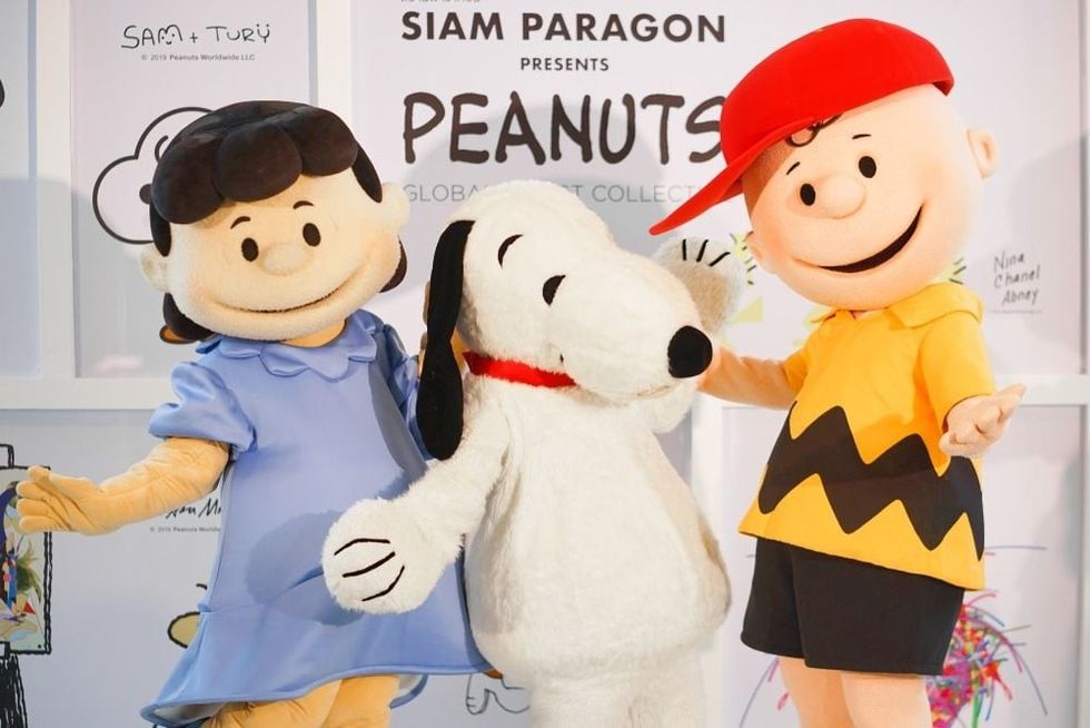 From Left to right is Lucy, Snoopy and Charlie Brown. Snoopy is first created as a comic strip by Charles M. Schulz.