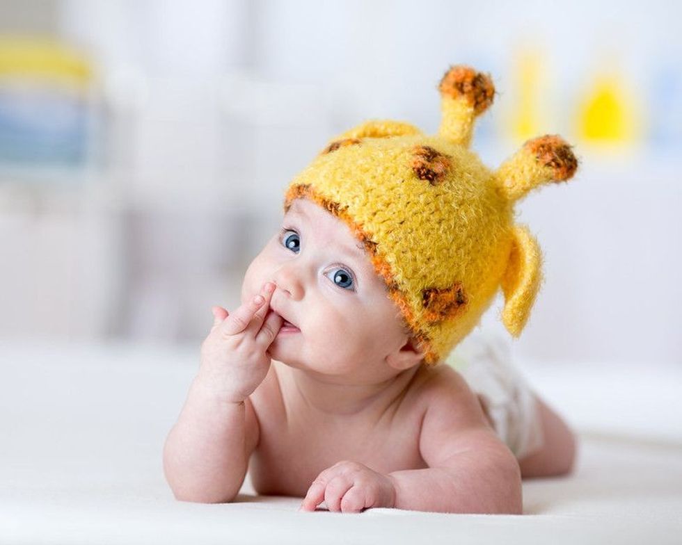 Funny baby weared giraffe hat