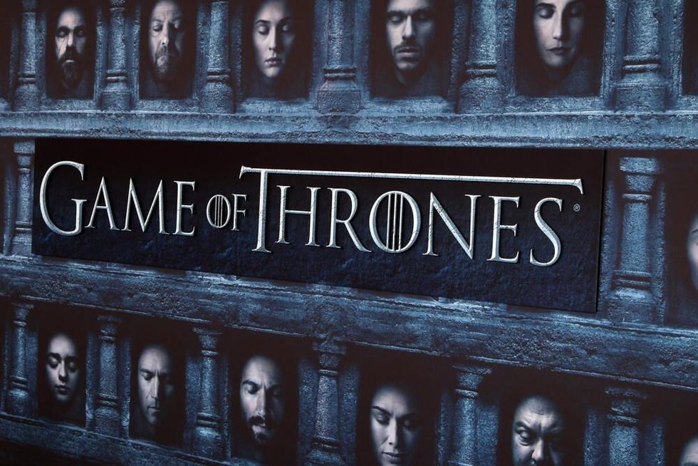 Game Of Thrones poster with all the lead characters.