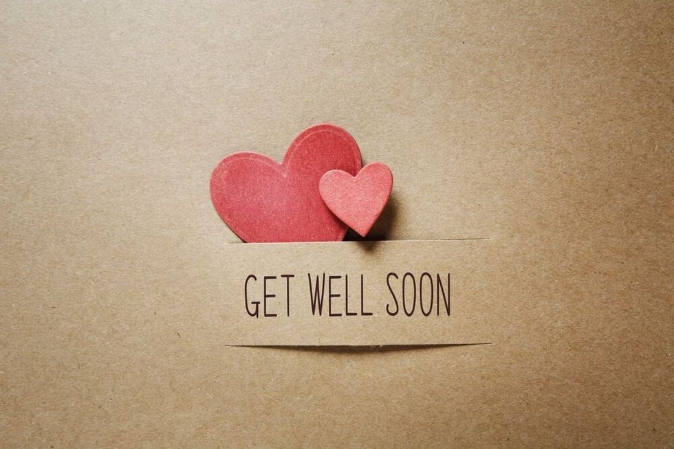 Get well soon message with handmade small paper hearts