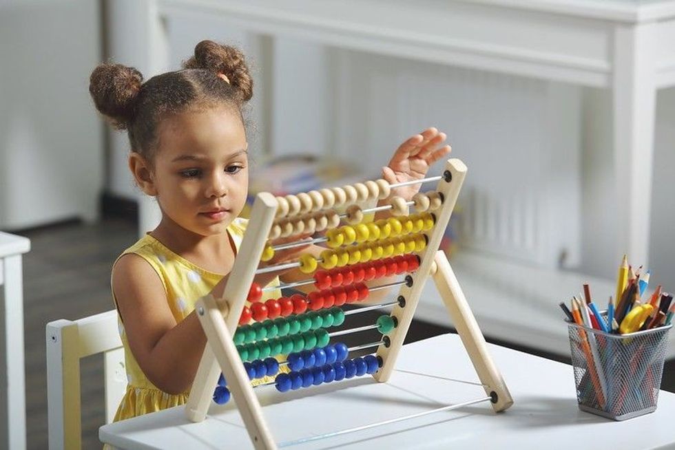 Girl learning Abacus