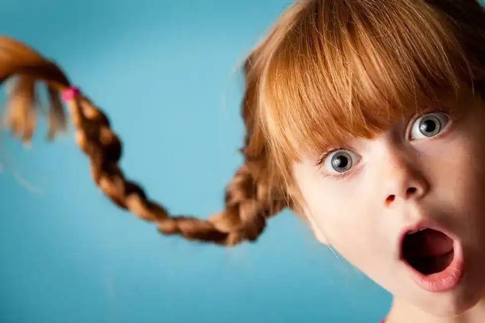 Girl ready to get her hair cut at home