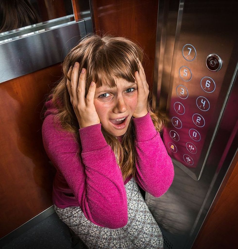 Girl scared in the elevator