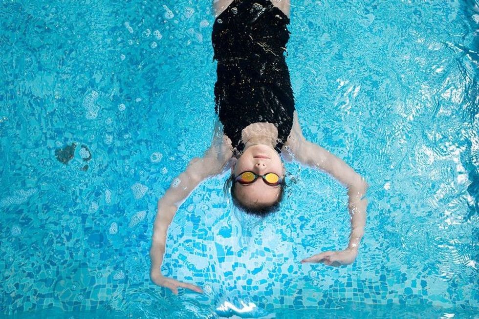 Girl swimming in a pool