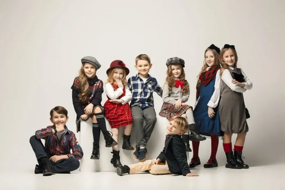 Group of kids wearing designer clothes