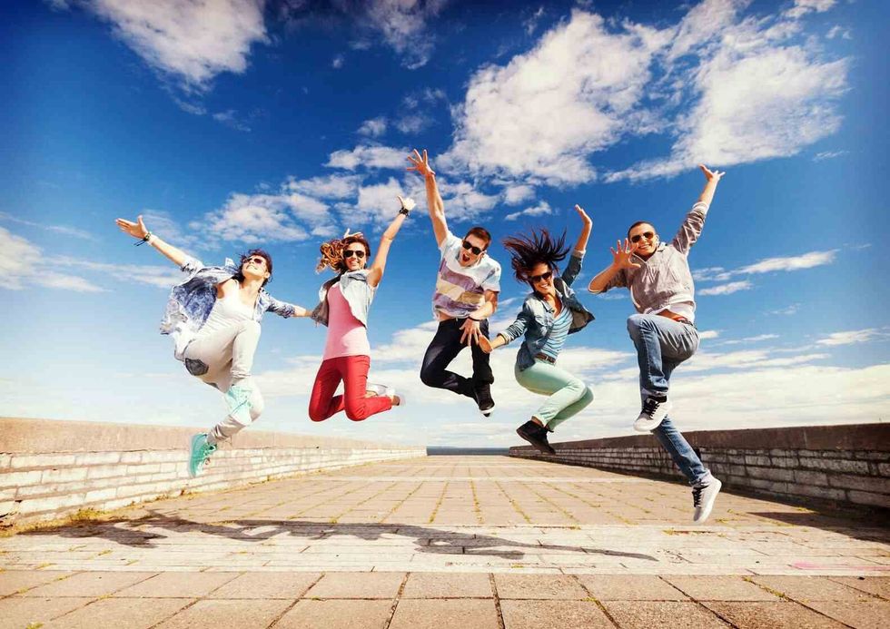 Group of teenagers jumping