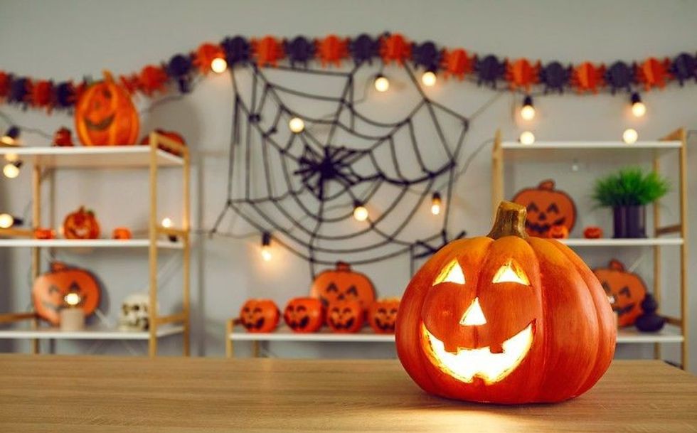 Halloween decoration with carved pumpkins and spider webs