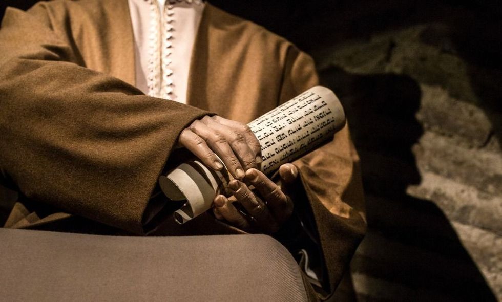 Hand with jewish writings