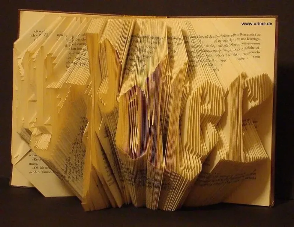 'Harry Potter' spelled out in folded book pages.