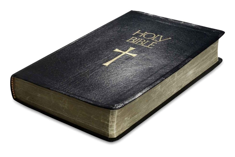 Holy bible on white background