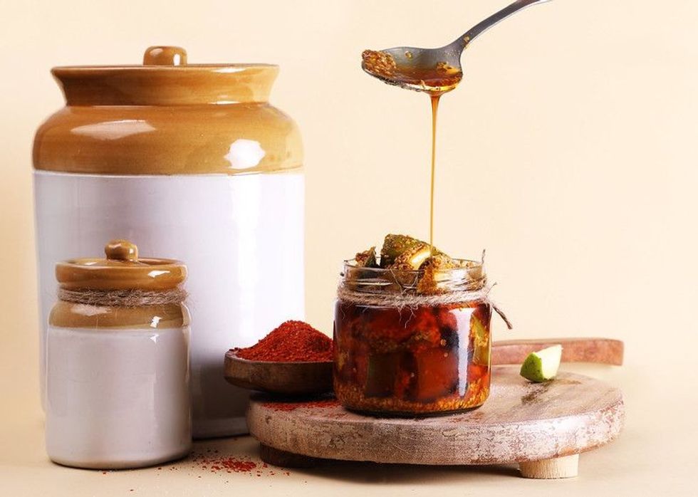Homemade Mango Pickle in a white jar