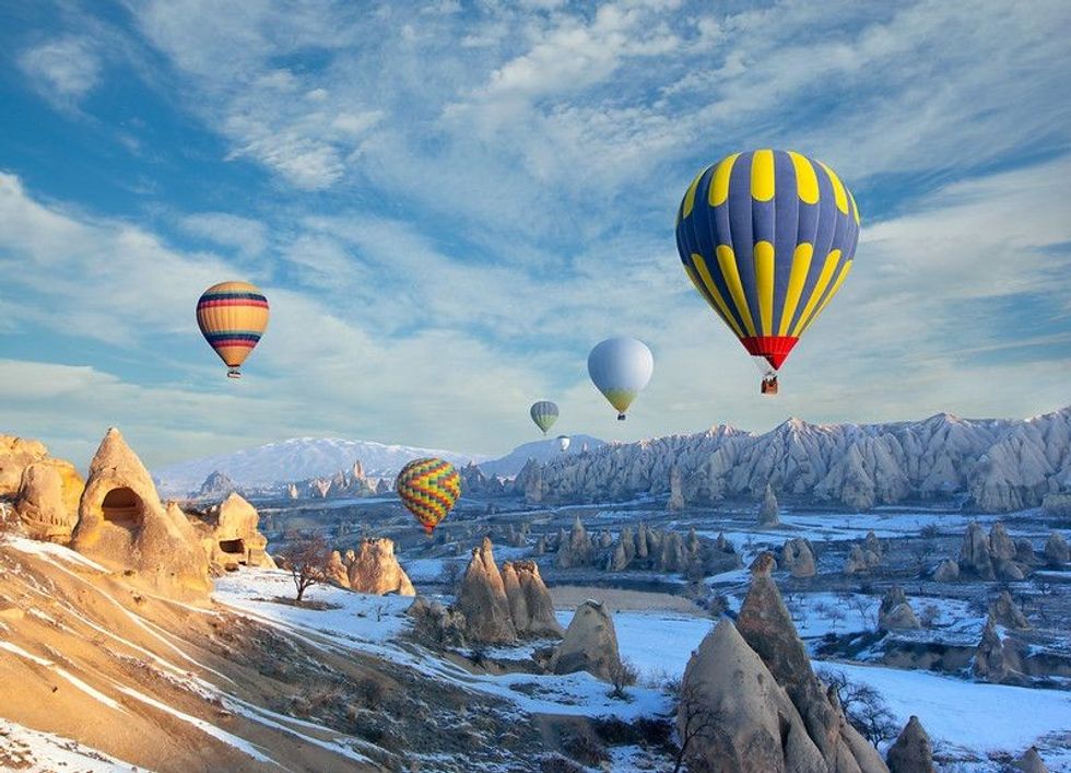 Hot air balloon flying over Cappadocia