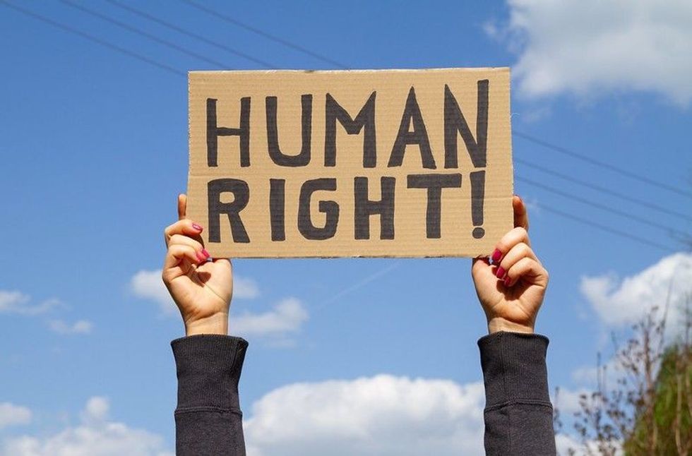 Human Rights Activist holding poster