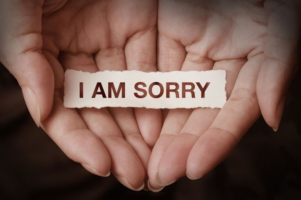 I am sorry text on hand design concept