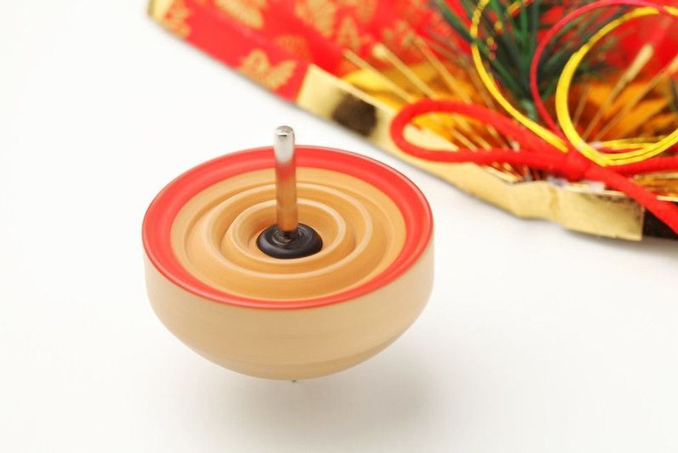 Japanese Folding fan and a spinning top